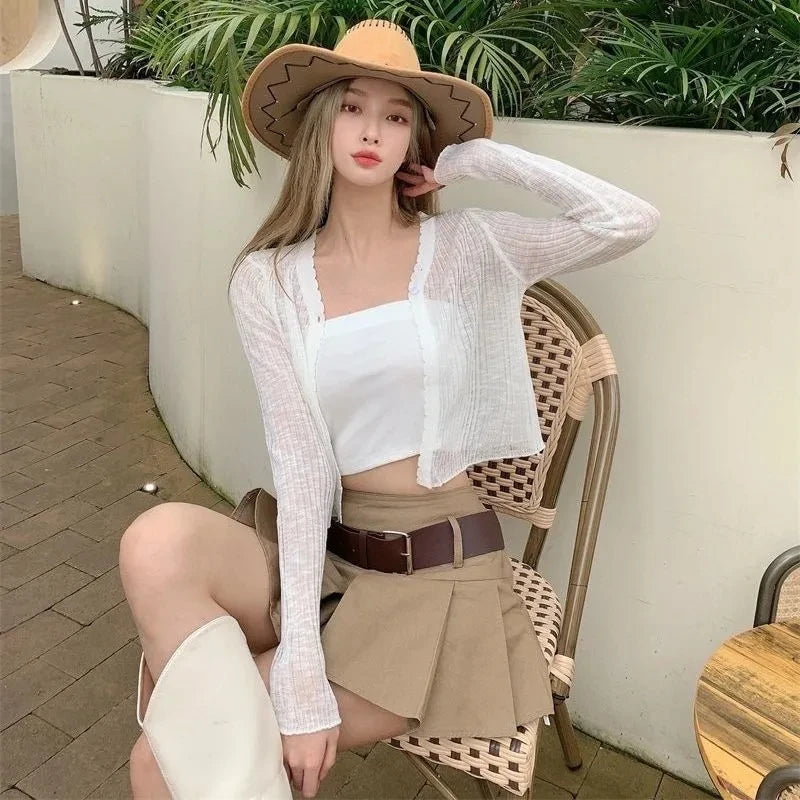 JOEVILU Thin Sunscreen Shirt Women's Summer Outerwear Crop Tops Hollow Out White Long-sleeved Cardigan Elegant Casual Shawl Coat