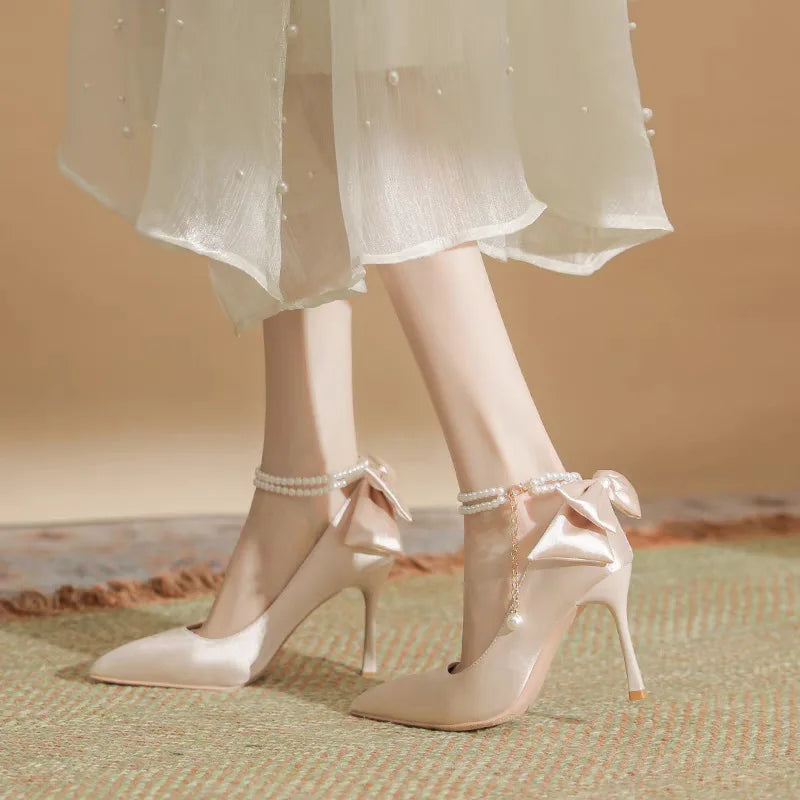 RBB Elegant White Stiletto Heels with Pearl Buckle & Satin Bow – Bridal & Party Pumps (Size 35–40)