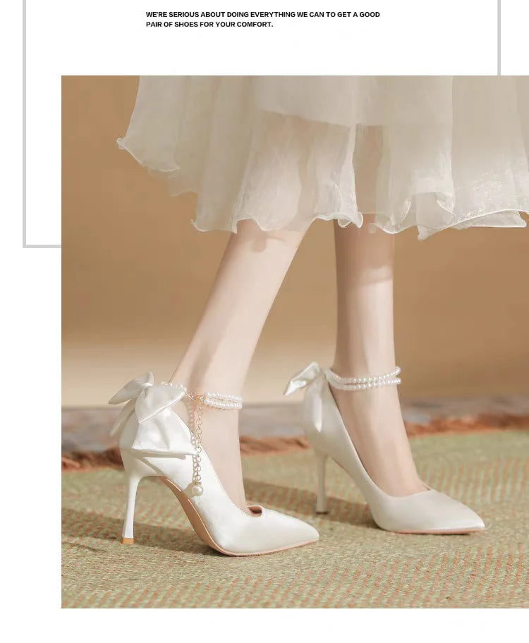 RBB Elegant White Stiletto Heels with Pearl Buckle & Satin Bow – Bridal & Party Pumps (Size 35–40)