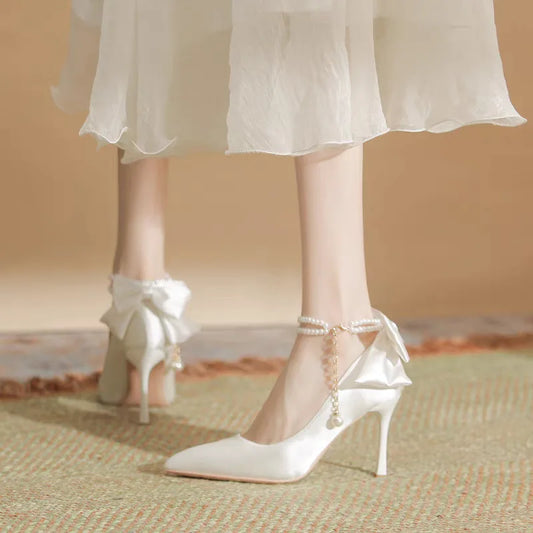 RBB Elegant White Stiletto Heels with Pearl Buckle & Satin Bow – Bridal & Party Pumps (Size 35–40)